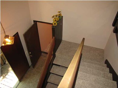ENTRANCE WAY FROM UPSTAIRS VIEW