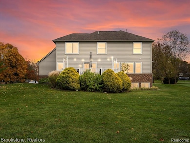 Back of property with a Deck for entertaining.