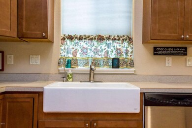 Upgraded cabinets and Farm Style sink
