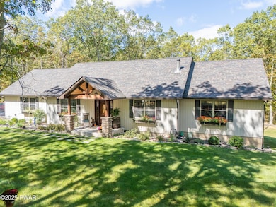 114 Whispering Oaks Rd, Greeley, PA 18425 - photo 2