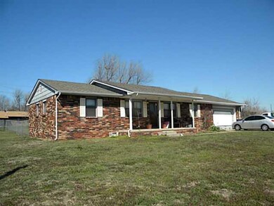 Exterior Front. Home sits on 1 full acre.