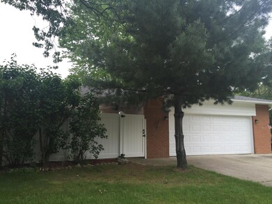 SIDE AND GARAGE VIEW OF HOME