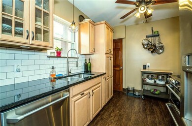 Kitchen - Polished granite counter top with subway