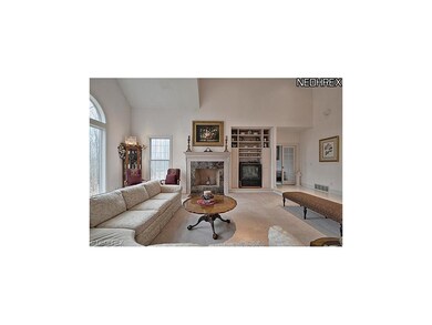 Built-ins and fireplace in the great room. French 