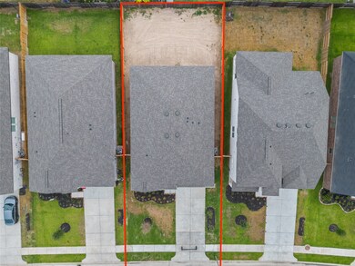 This home sits on a large lot with ample yard space in front and the back, lush landscaping and a well-maintained yard.