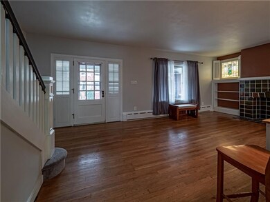 Enter into the generously sized family room with o