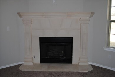 Beautiful gas log cast stone fireplace. Instant on
