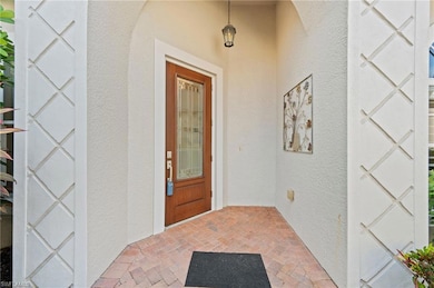 Mediterranean / spanish home with a garage and a f