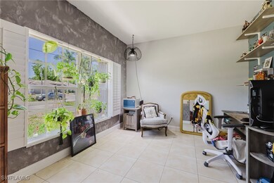 Office featuring baseboards, tile patterned floori