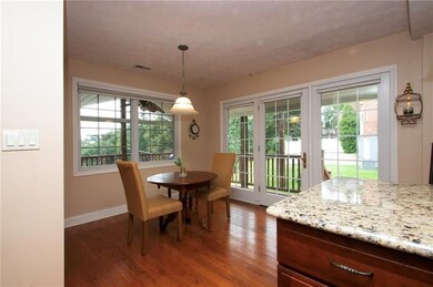 Another view of the kitchen showing the casual din