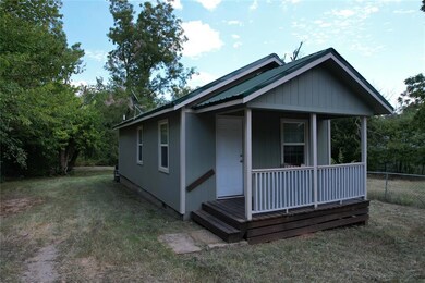 View of front of home featuring a front yard