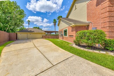 Long driveway & 3-car detached garage