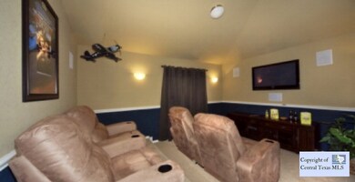 media rm of model: Photo is of this same plan of the model home. Options and upgrades will vary to subject home.