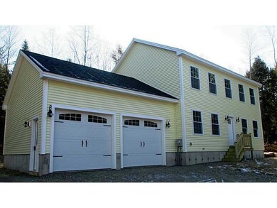 Exterior Front. 2 car garage with...