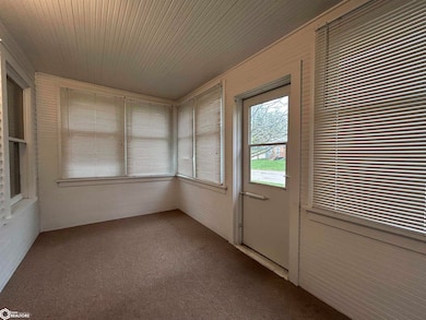 This porch is nice &  bright...thanks to banks of
