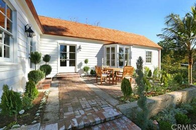 Original brick patio and terrace off living room a