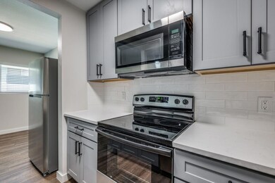 Kitchen with light hardwood / wood-style floors, s