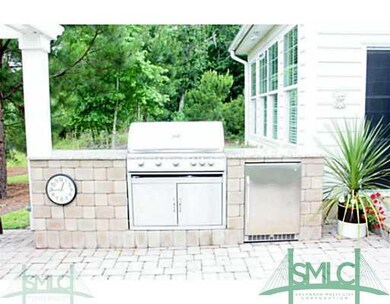 Patio/Deck. Outdoor grill and refrigerator.