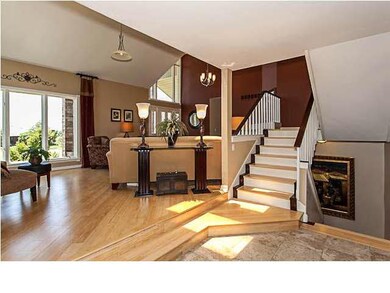 Wood treads on the stairs continue the clean lines