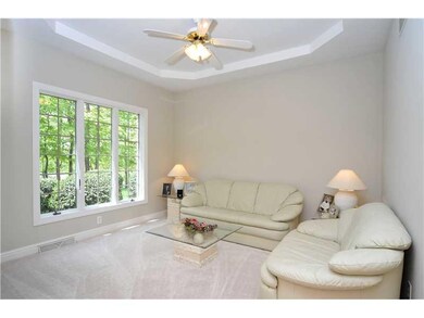 Living Room. A large window illuminates the 13X12 