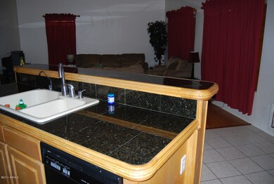 Black granite tiles in kitchen island