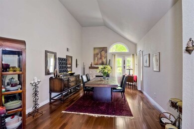 Dining room w Jerusalem stone fireplace, vaulted c