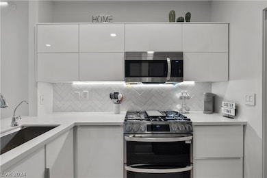 7107 S Durango Dr unit 203, Las Vegas, NV 89113 - photo 3