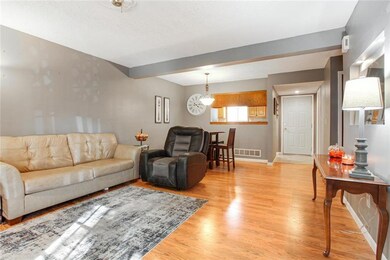 Spacious Living Room with beautiful flooring that 