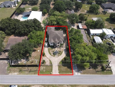 Aerial perspective of suburban area featuring property parcel outlined