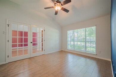 Bright and inviting room featuring large windows f
