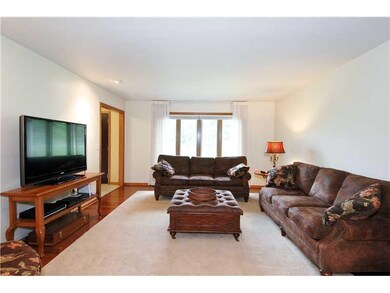 Living Room. Lots of Windows & Hardwood
