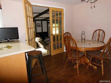 Kitchen Dining. French doors to Family Room.