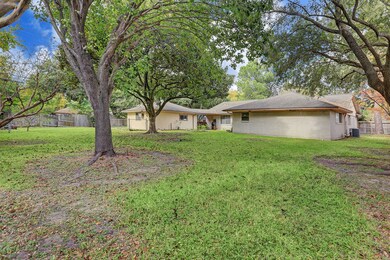 Hugh, beautiful backyard with mature trees