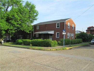 Exterior Front. Duplex is on corner lot