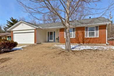 Vinyl and Brick exterior, covered front porch.