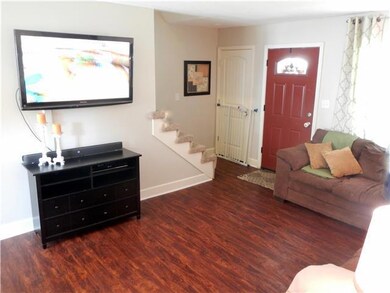 Long walls hold can hold a large sized TV.