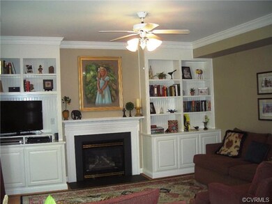 Family room has hardwood floors and built-ins