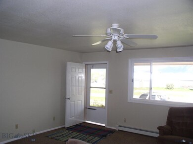 Living room with large front window