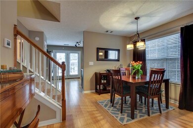 Formal dining room is located between living room and kitchen...room for a large table and buffett...nice natural light from oversized window.