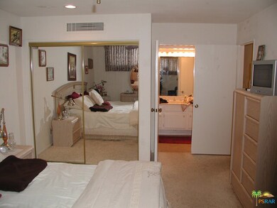 Bedroom with entry to bath