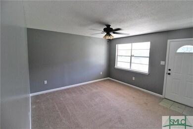 Great Room has Brand New Carpet, Fan, switches and