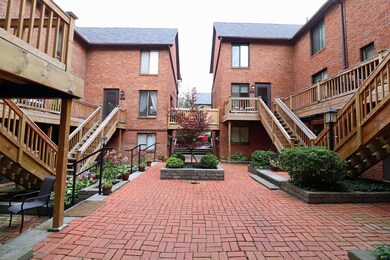 Courtyard open to street & parking area