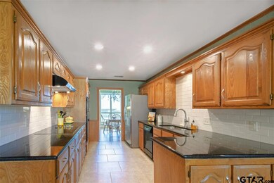 717 Cedar Creek Dr, Tyler, TX 75703 - photo 4