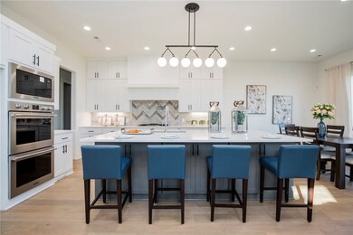 The kitchen is a chef's delight, featuring a spaci
