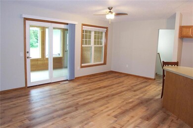 Spacious dining area! New lighting/ceiling fan. Patio leads out to very comfortable 3 season screened porch with access door to backyard / just steps to easy access to the trail. WOW! RARE FIND IN MENOMONIE!