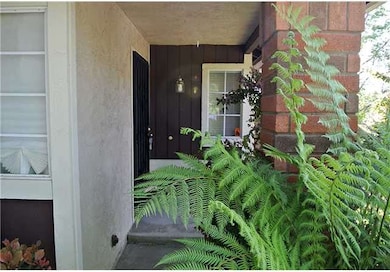 Serene and inviting covered front entry way and po