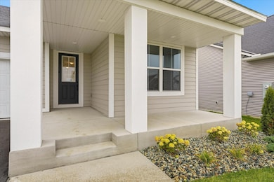 Greet your guests on the welcoming, covered front porch.