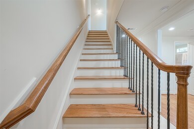 This photo shows a bright, inviting staircase with