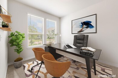 Office space featuring baseboards and carpet floo