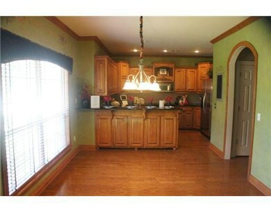 Kitchen. View of casual dining & kitchen area.  Ha